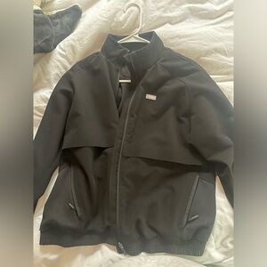 Black FIGS Sydney scrub jacket